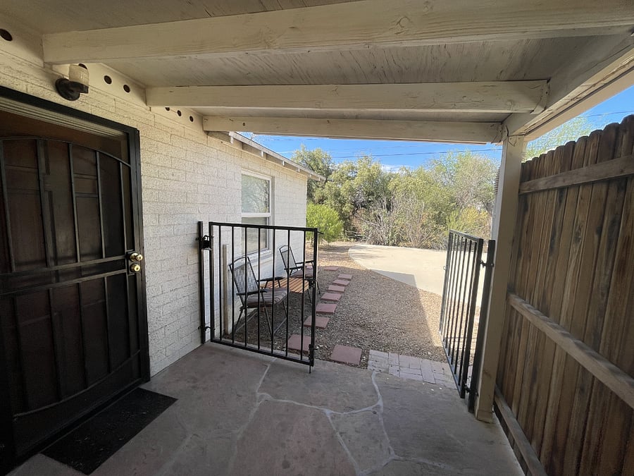 Gate from front porch to basketball half court
