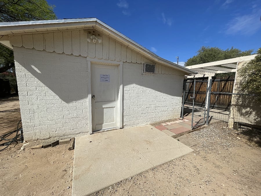 Laundry room door. Front entrance is around the corner to the right