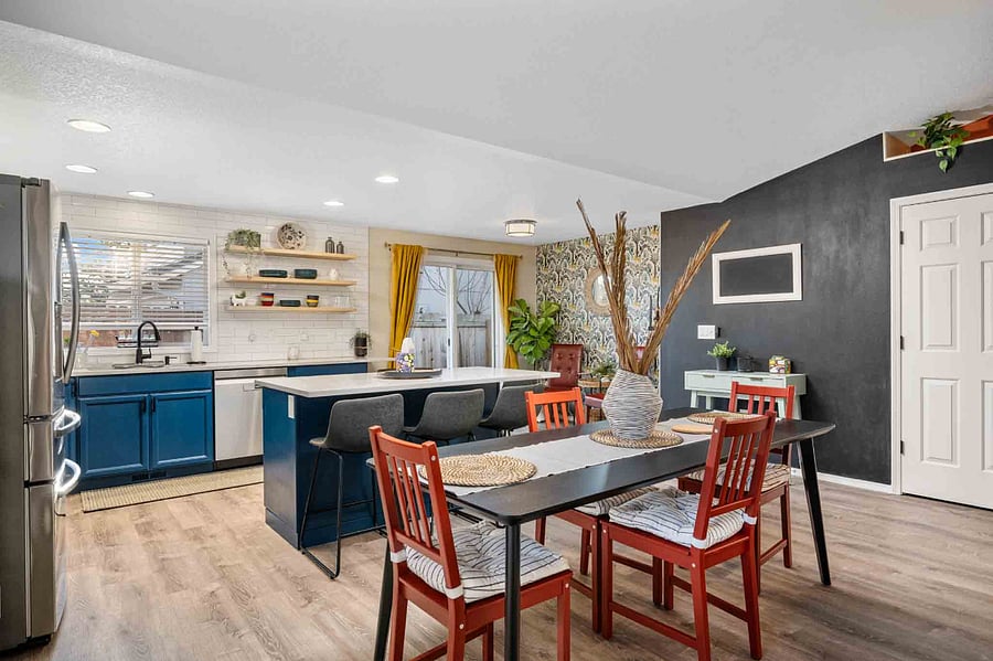 The dining table offers a welcoming spot to enjoy meals or gather throughout the day.