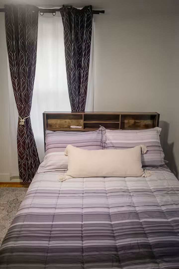 Bedroom 2
Double bed
Bed linens provided
Clothing storage and hangers
Room-darkening shades
