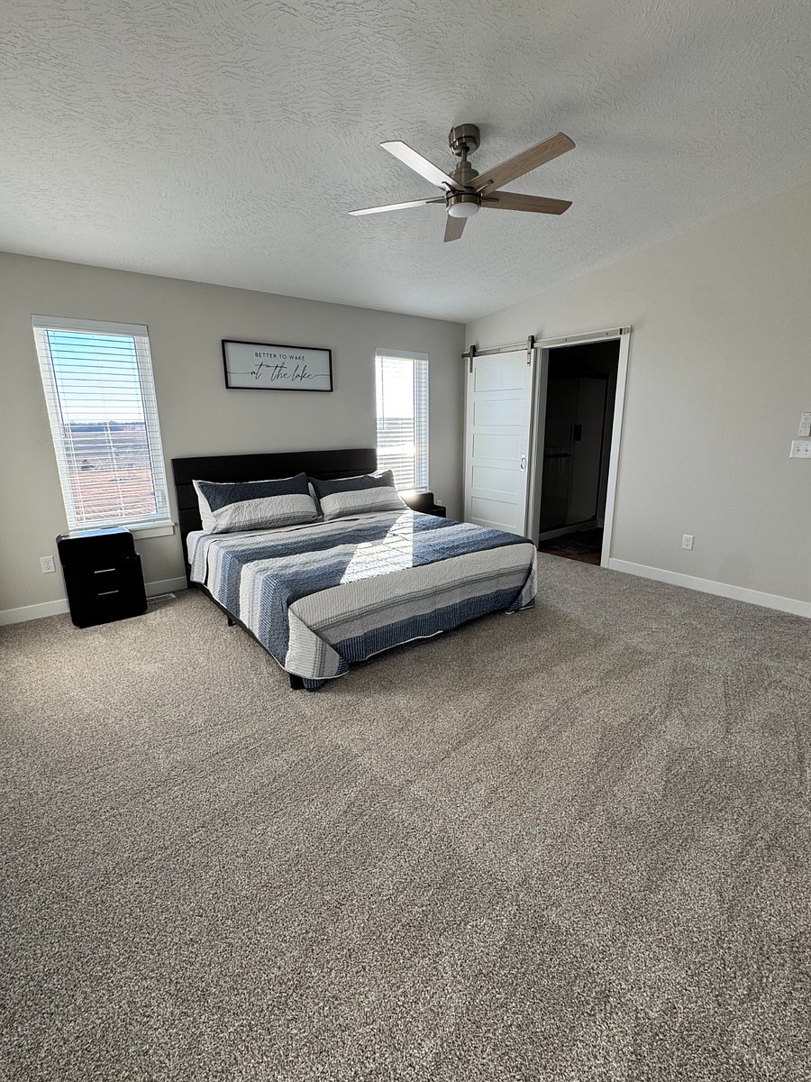 Master bedroom with large bathroom and walk in closet. 