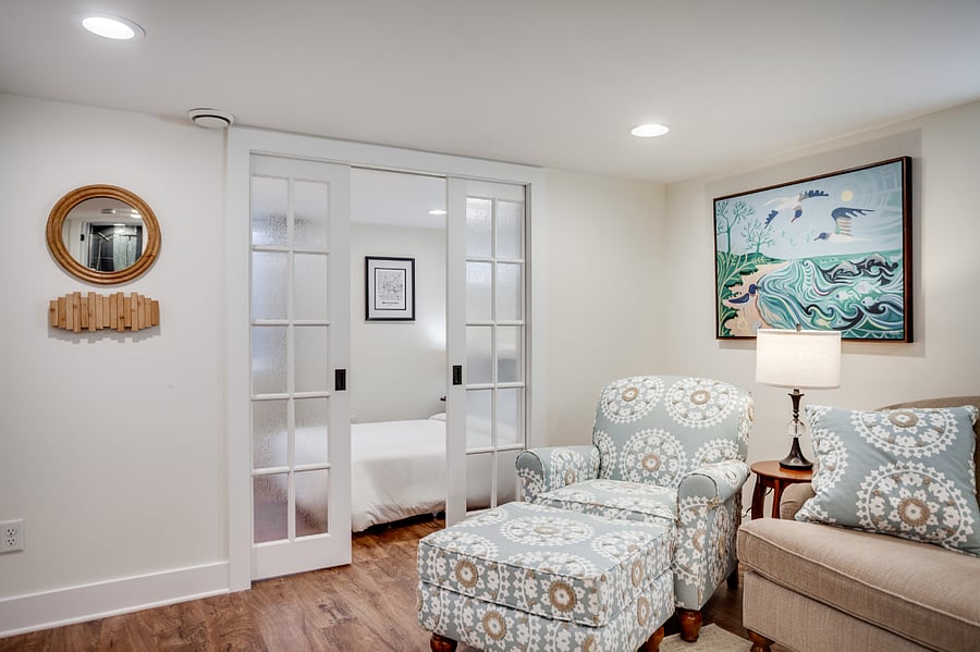 Frosted pocket doors offer separation from the second bedroom to provide privacy for sleeping or work.