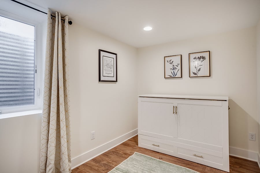 The full-sized murphy bed can be stored and the space used as a dedicated office.