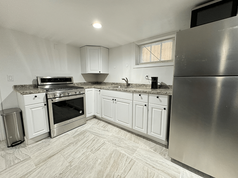 Kitchen area. Utensils and all items in draw and cabinet. (not shown in picture)