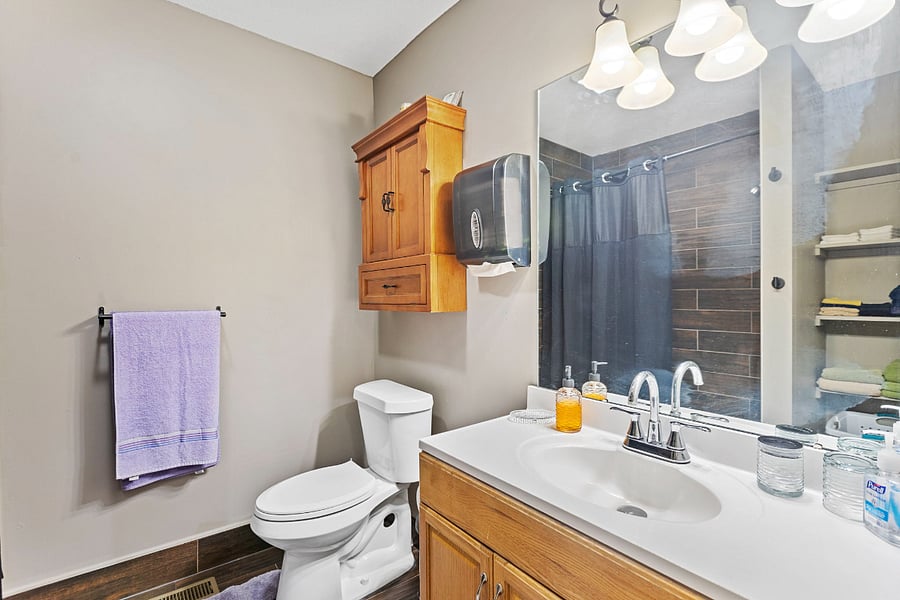 Clean, updated bathroom with full tub and shower