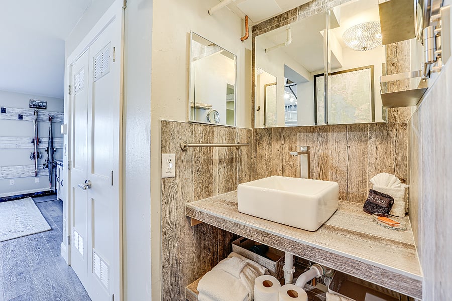 Bathroom vanity looking into the living room.
