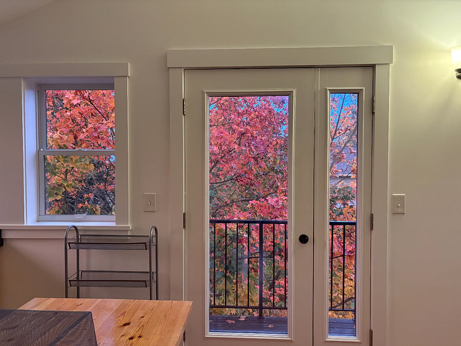 Fall colors are lovely through the windows and balcony door!