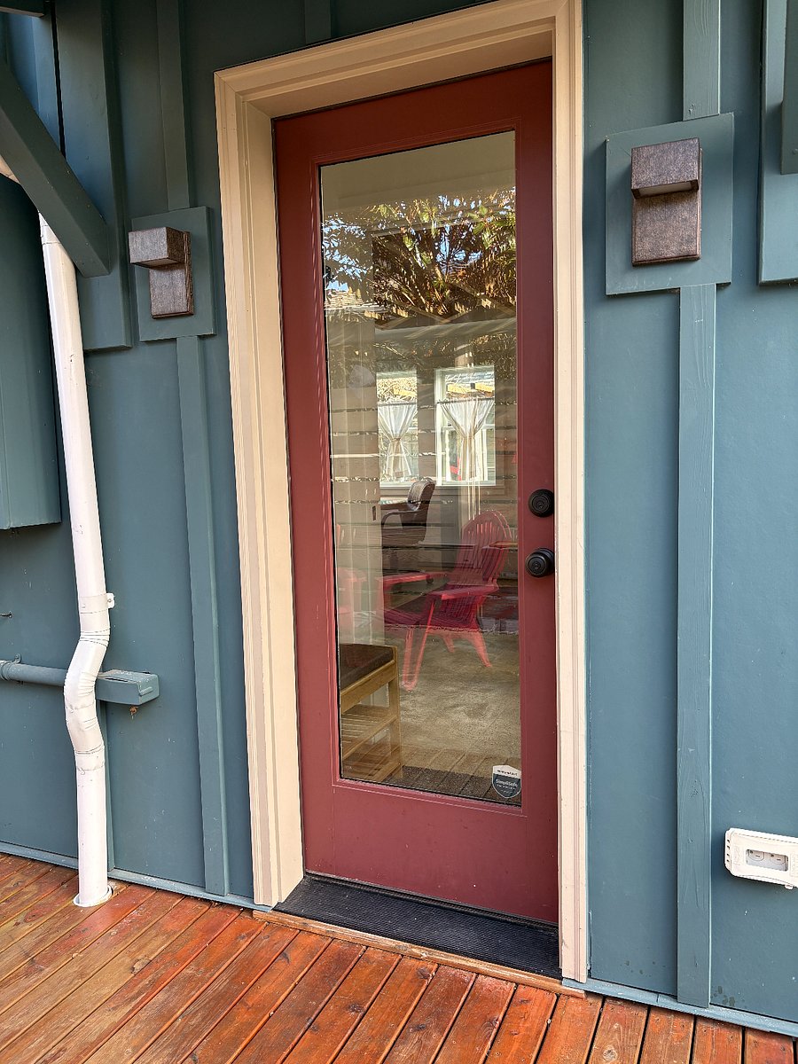 Covered main entrance; pocket door on other side of entry way for privacy 