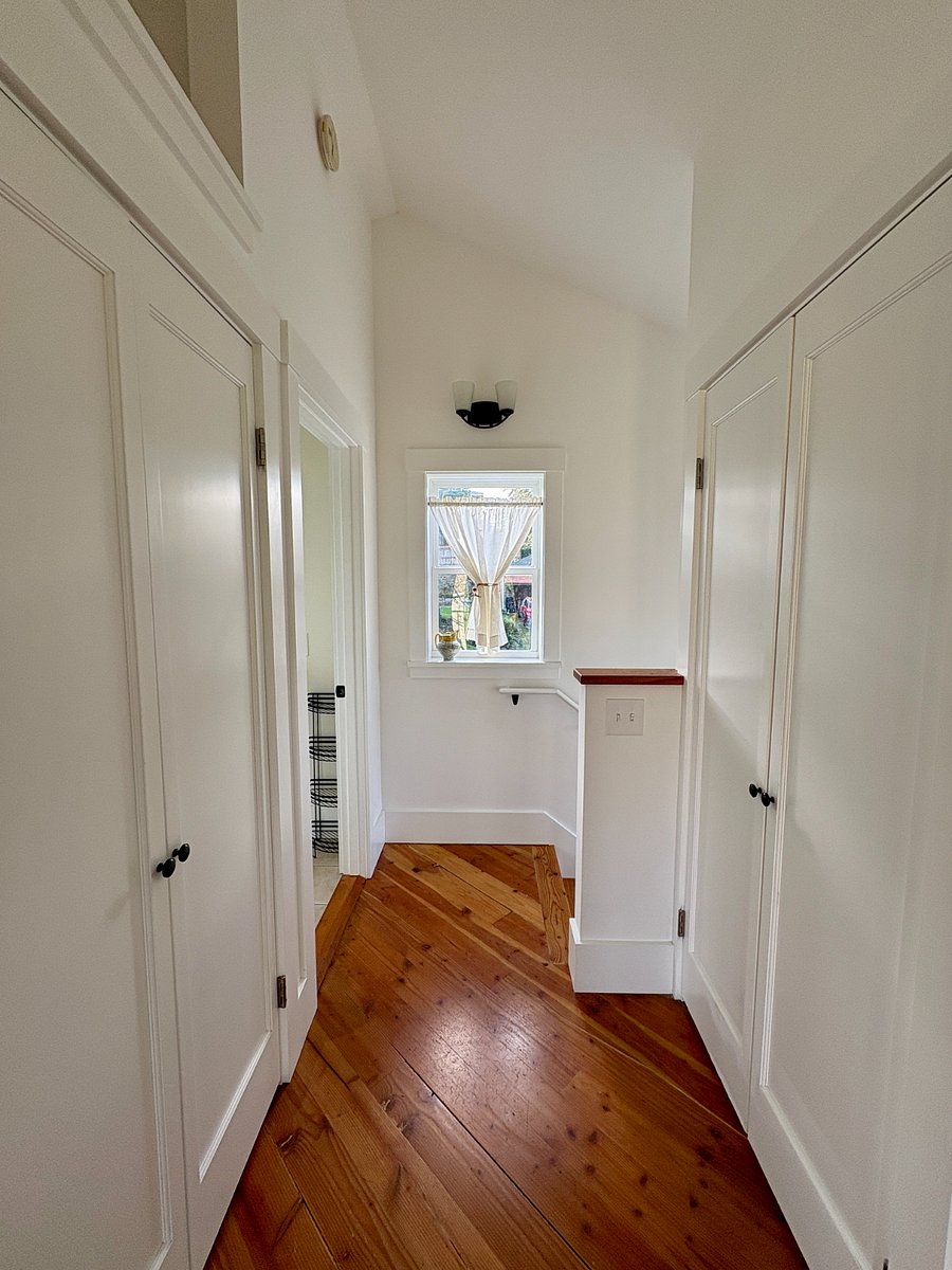 Two roomy closets at top of stairs