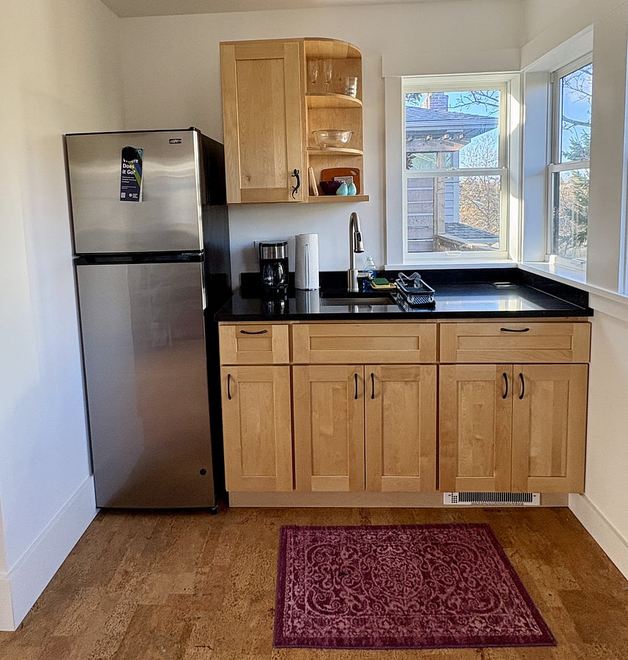 First floor kitchenette is set up for coffee and gets a lot of use in summer months for outdoor meal prep.