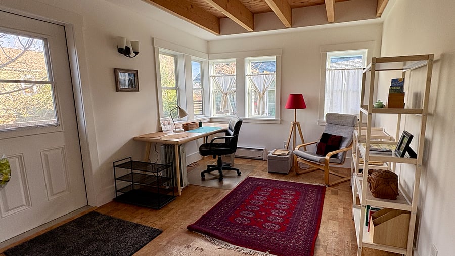 View of workspace which overlooks back yard and deck.