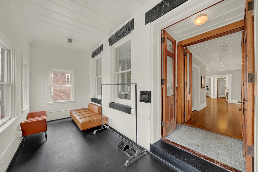 Huge entry foyer for sitting in the sun and reading a book.