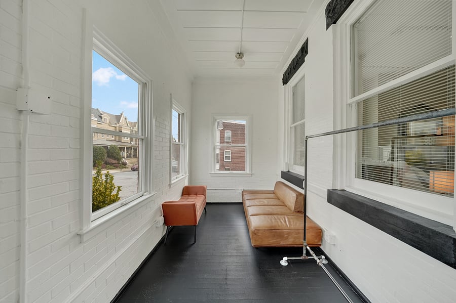 Huge entry foyer for sitting in the sun and reading a book.