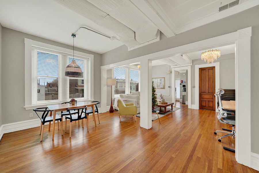 Huge open living/dining room area flooded with natural light.