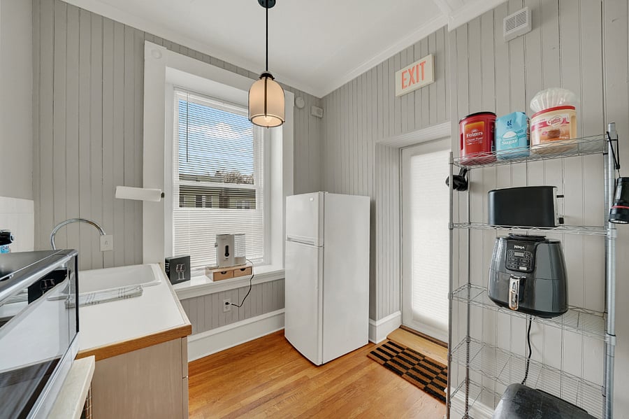 Kitchenette has everything to make basic meals: Dual electric hot plate with pots and pans, microwave, air fryer, toaster, and all kitchen ware.