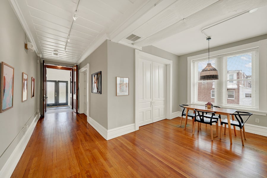 Huge open living/dining room area flooded with natural light.