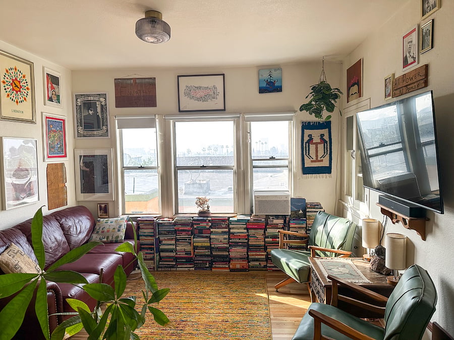 Shared living room with lots of natural light, a beautiful view, and comfortable seating.