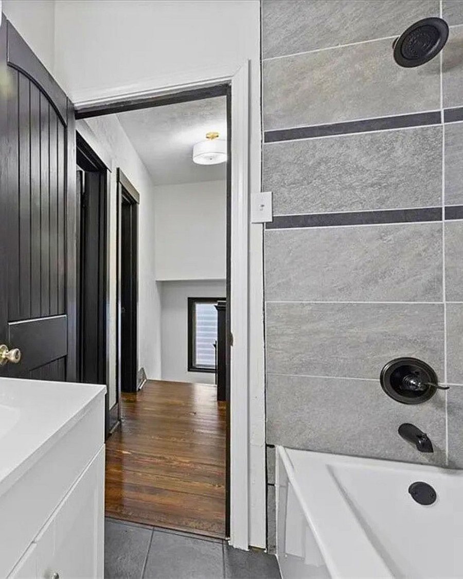 View walking out of the shared bathroom