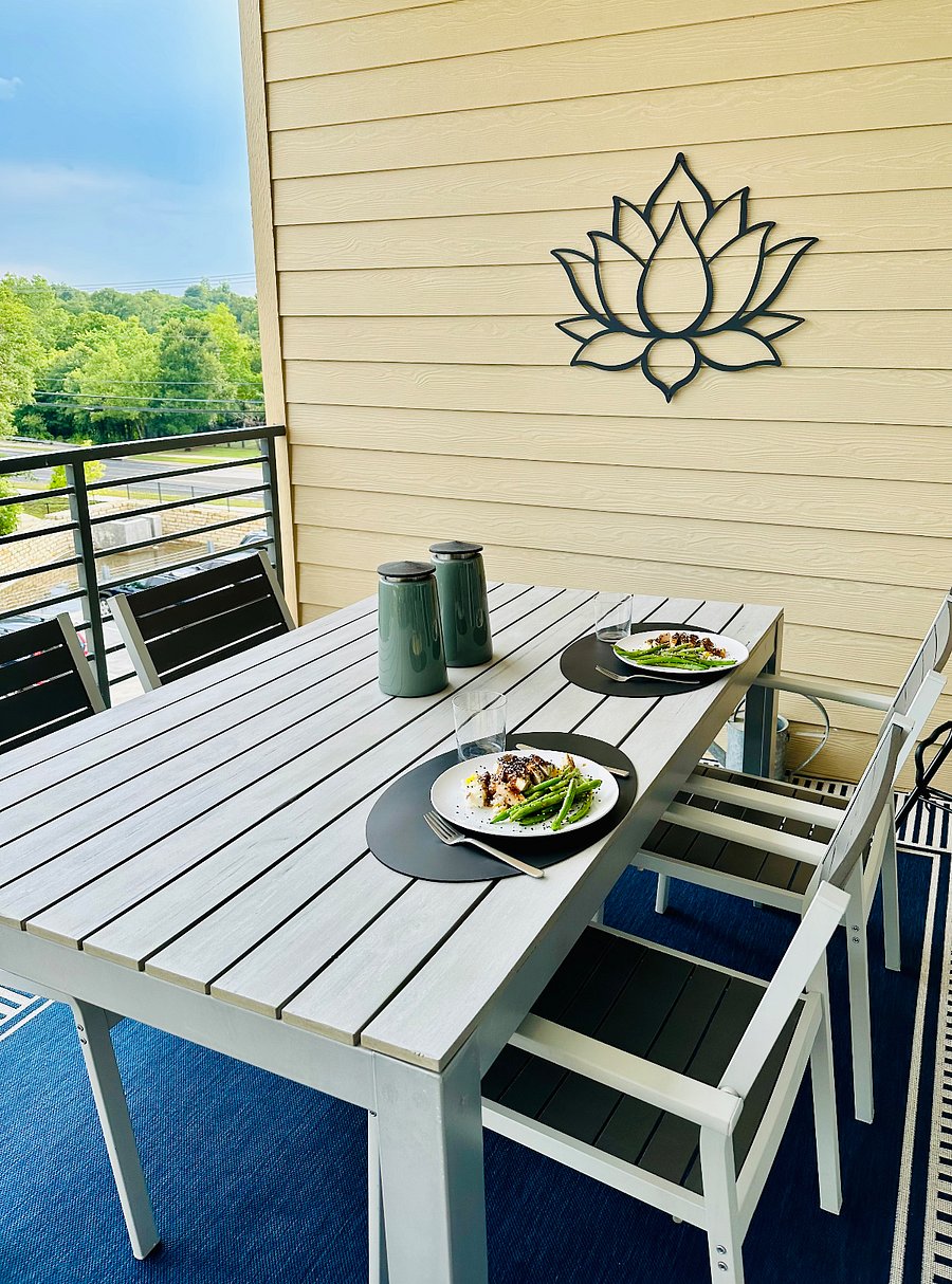 Dining al fresco on the balcony overviewing the park