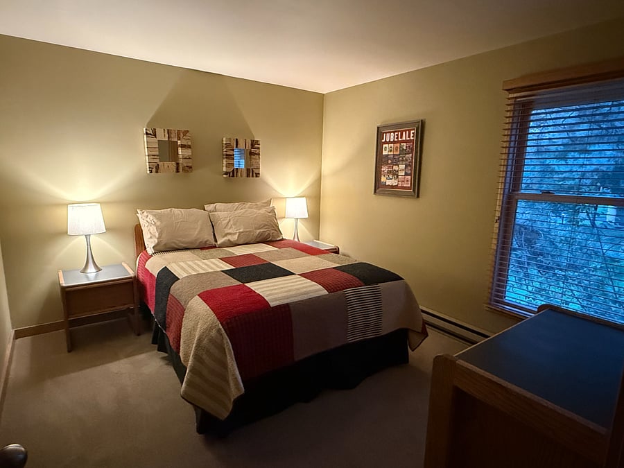 Downstairs bedroom that can easily be blacked out for working night shift. 