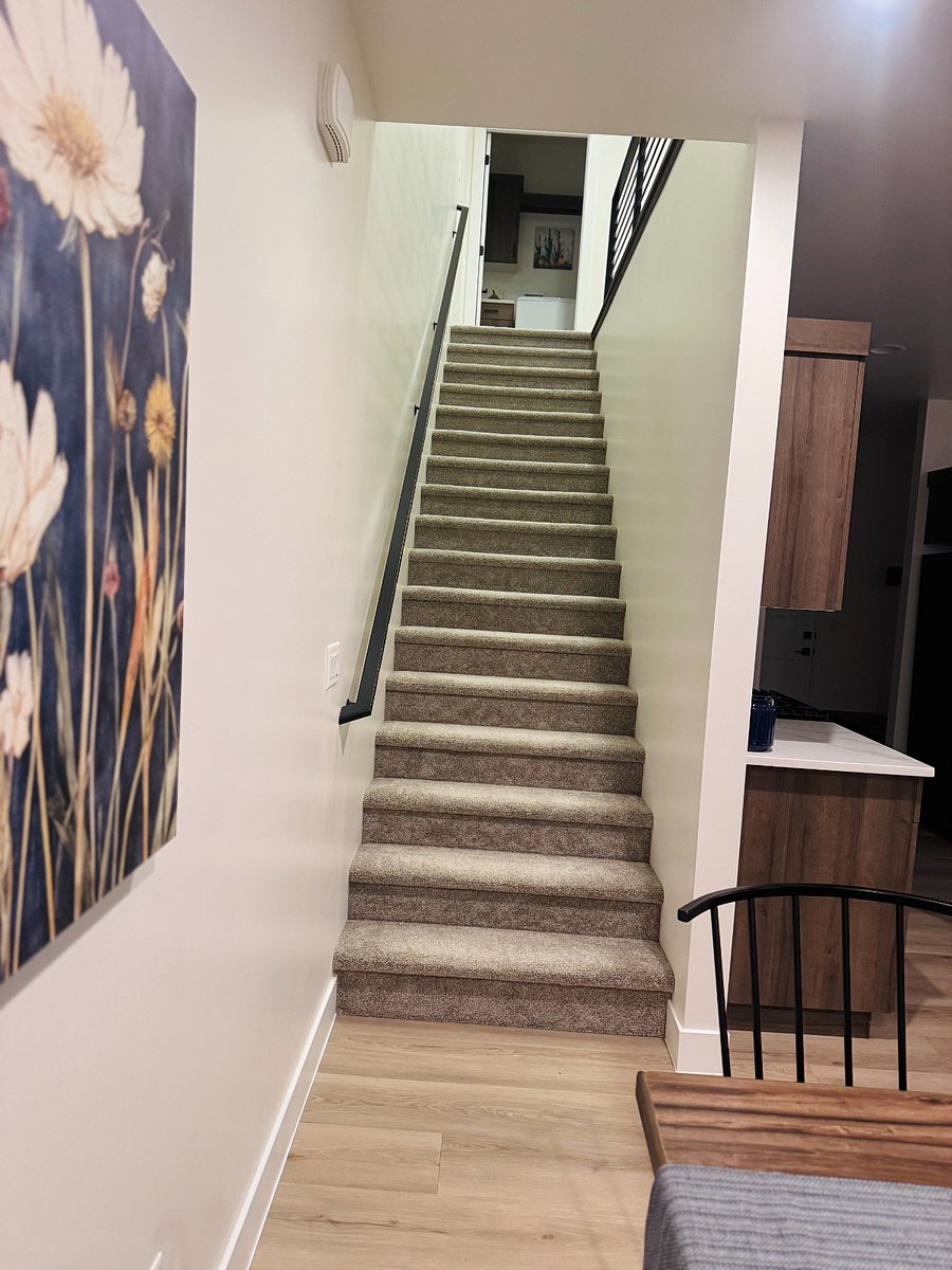 Stairs to bedrooms and laundry