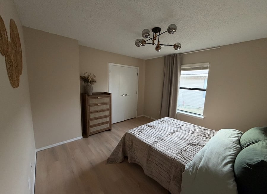 2nd bedroom w/Queen size bed. All bedrooms have private closet for clothes + dresser and nightstands w/charging station