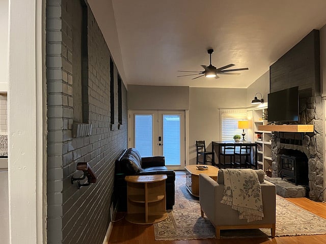 Den/Family Room -- Huge bonus space w/Smart TV, full size couch, books for adults and kids, puzzle, blocks, and a bar height table perfect for family game night.