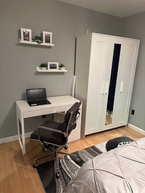 Computer desk and dresser in bedroom