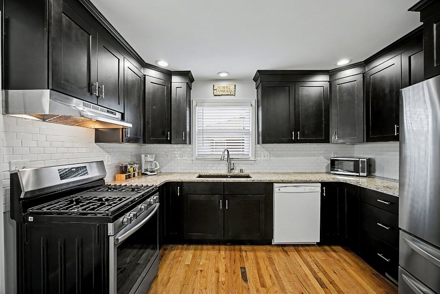 Kitchen with gas stove & granite countertops