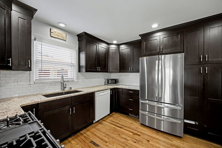 Kitchen with gas stove & granite countertops