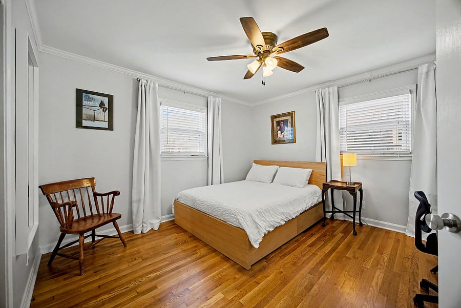 Bedroom #2 with queen size bed, designated work space & custom built closet