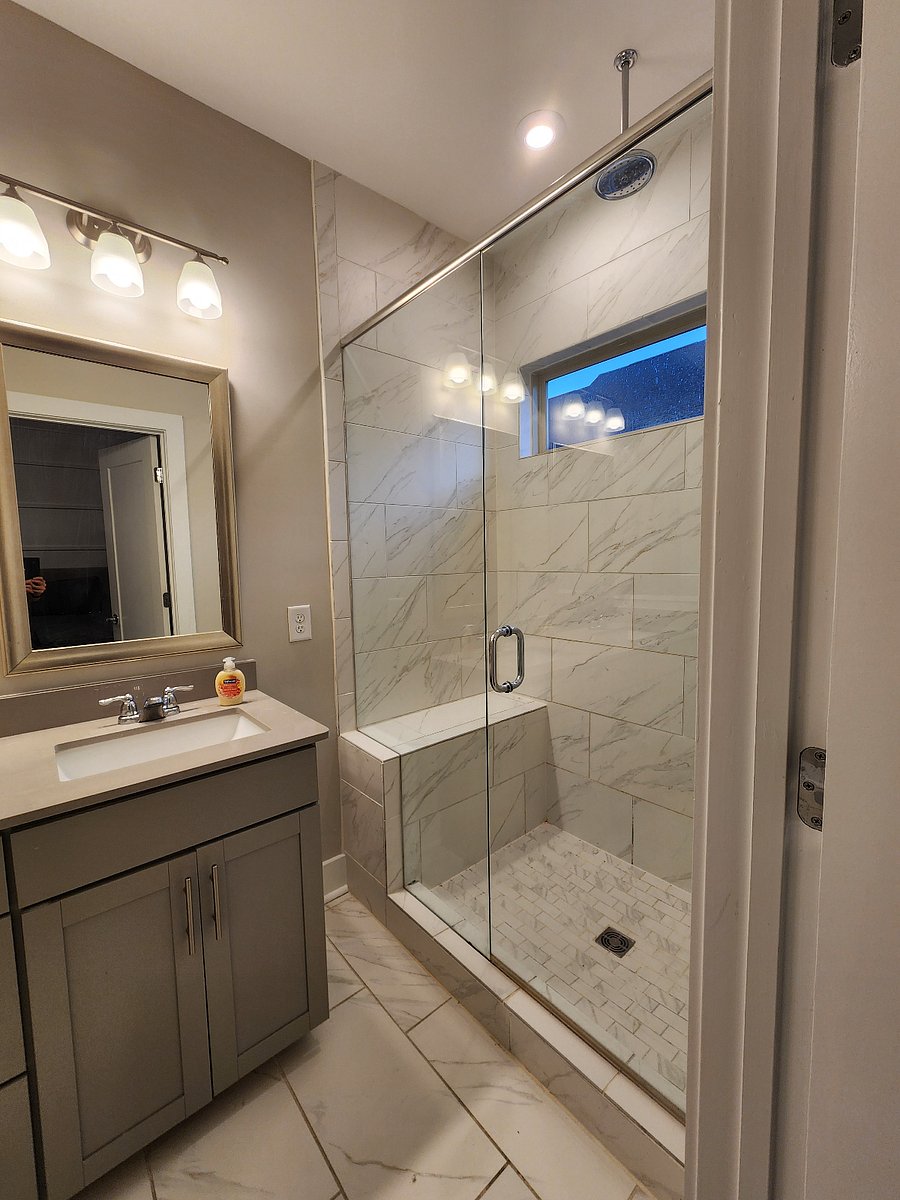 Shower has a waterfall showerhead option