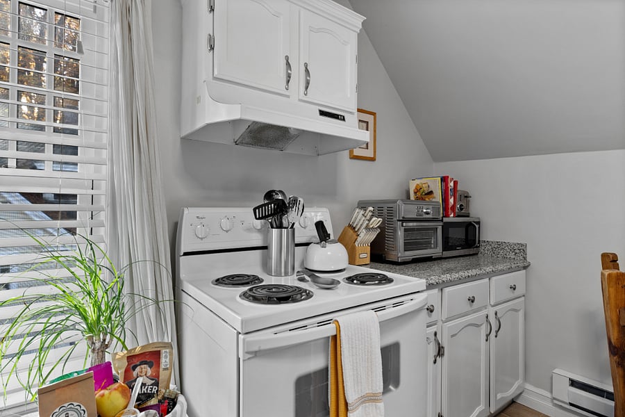 Kitchen has full fridge, stove/over, coffee maker, air fryer, blender. Appliances are Whirlpool and Cuisinart. 
Note: the kitchen does not have a dishwasher. 