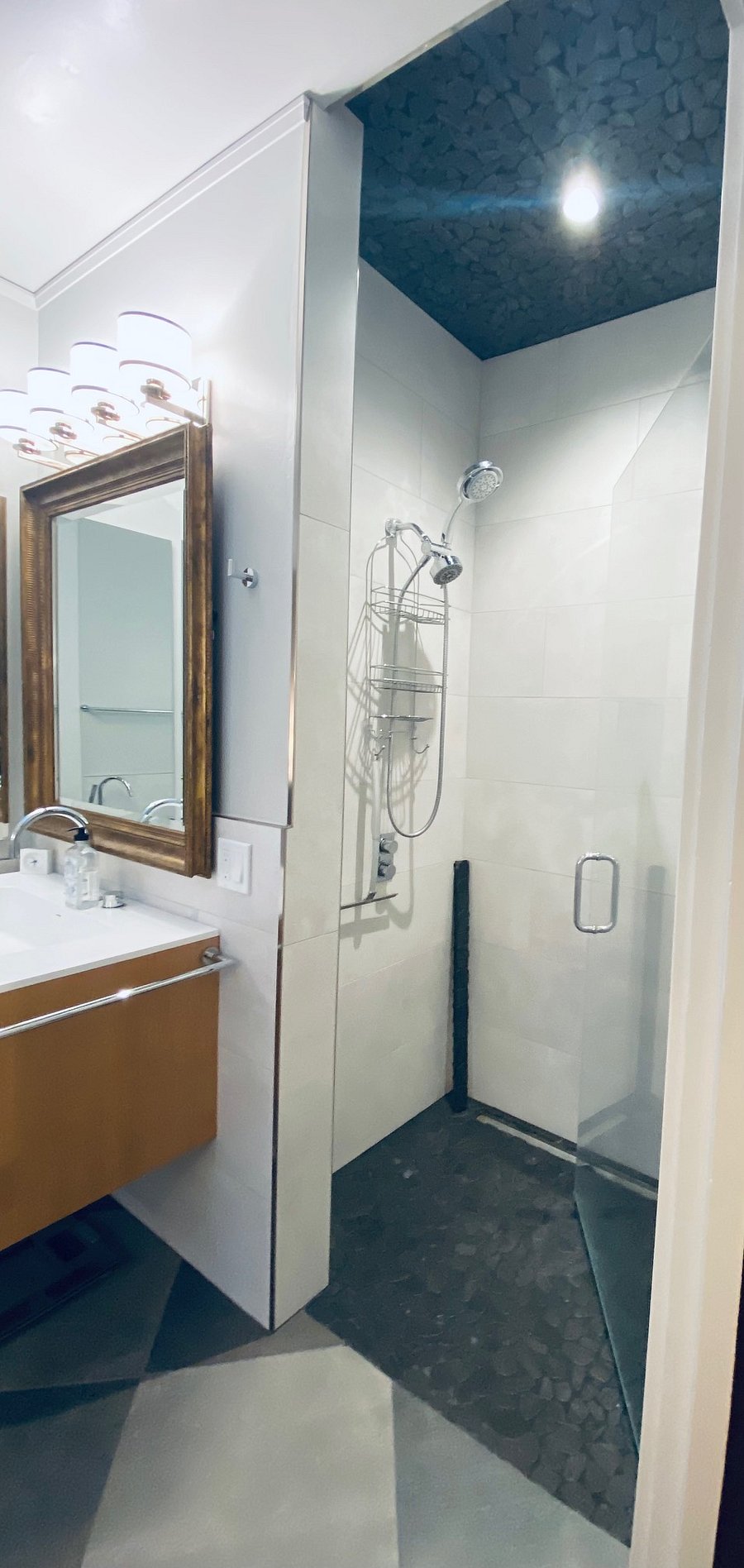 Primary Bathroom-Vanity sink, shower, toilet.