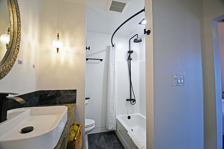 Full bathroom with tub/shower.