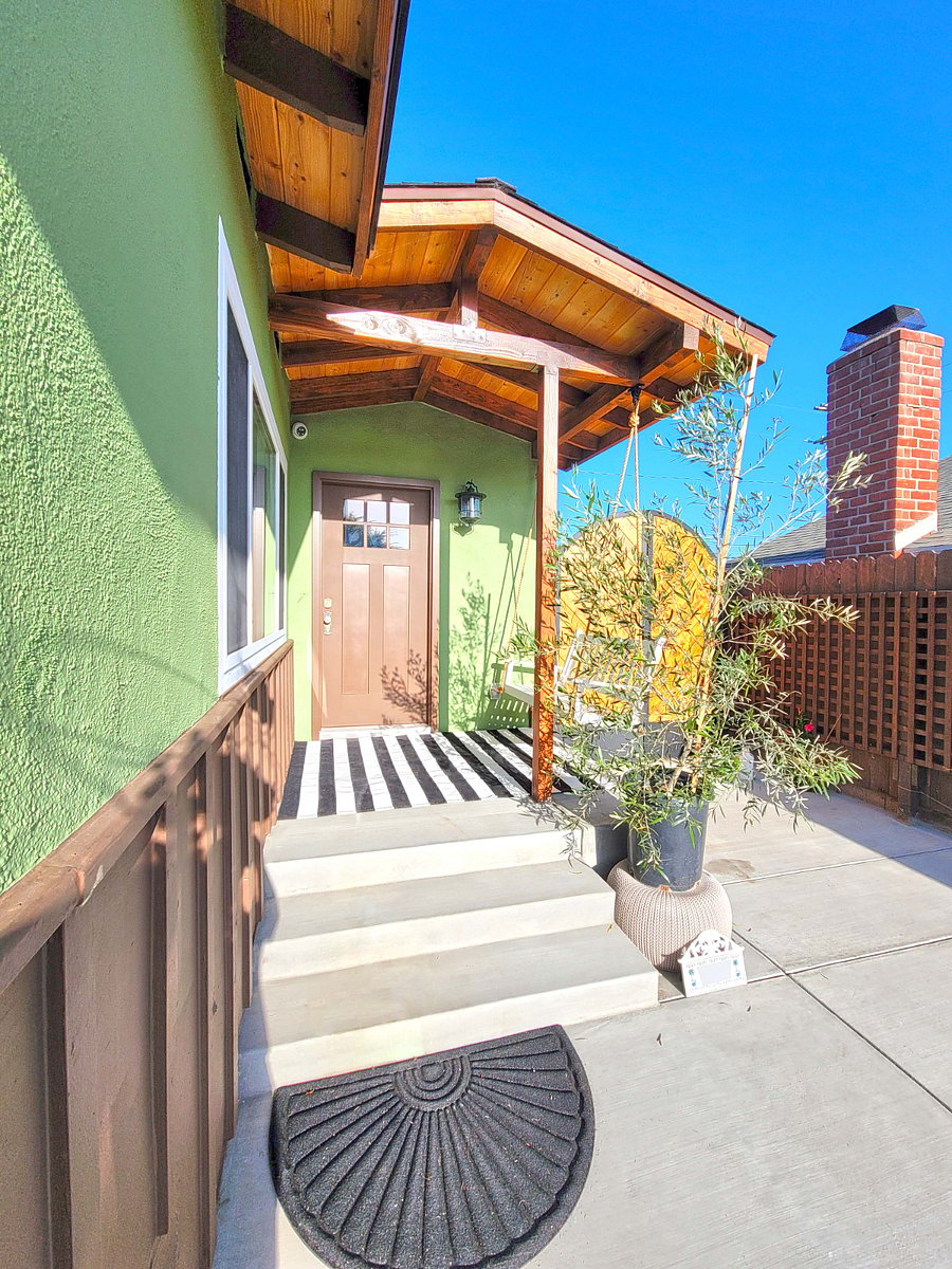 Private front porch with swing. Parking available directly next to porch.