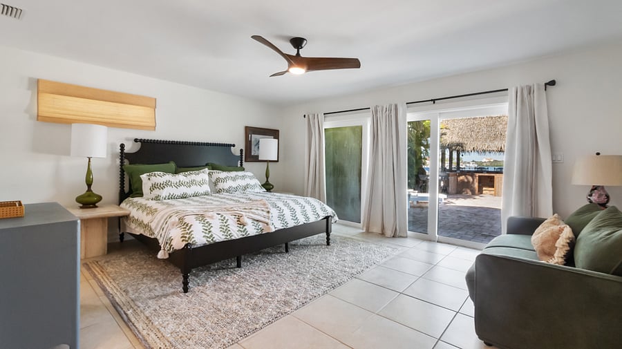 Primary Bedroom with ensuite bath and laundry room
