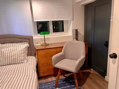 Bedroom 2 has a twin bed that sleeps 1 and a desk and chair perfect for working from home. Great for a guest bedroom/office.