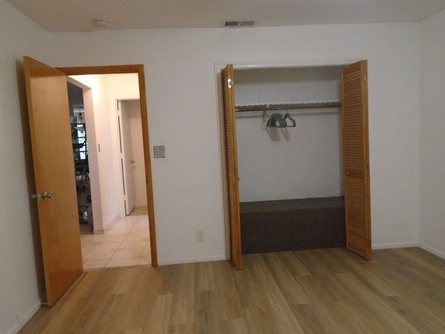 Empty Guest Bedroom can store your luggage and extra hanging space
