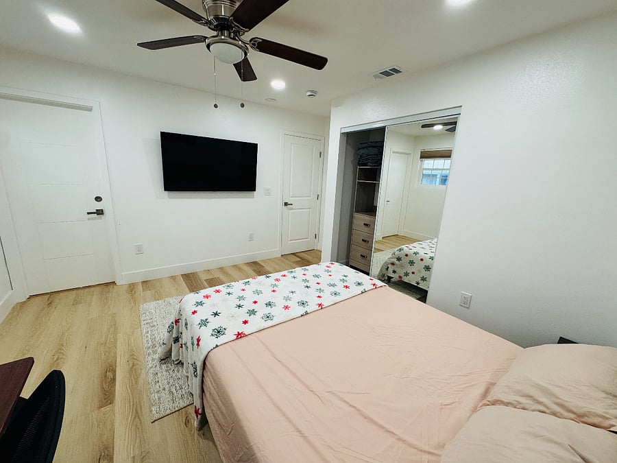 Master suite: customized closet, TV and desk