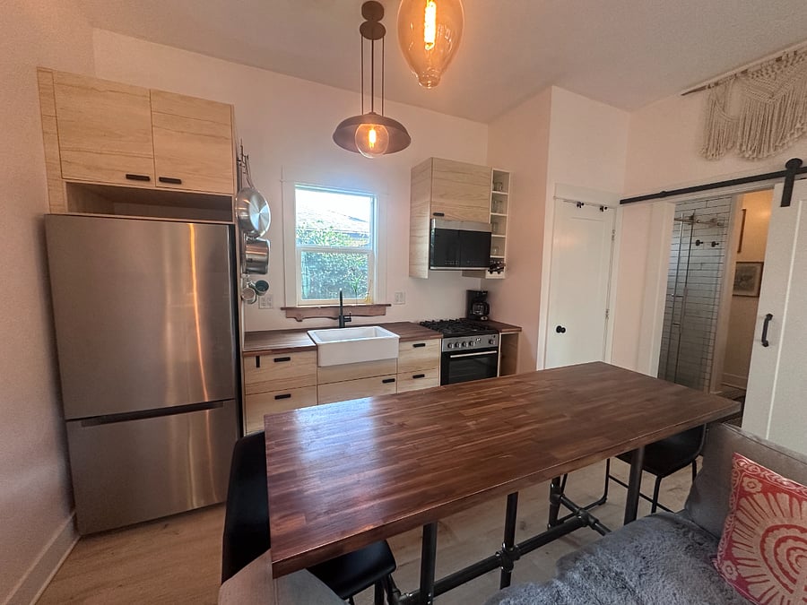 Updated Modern Kitchen and Kitchen workspace with a view of the garden.