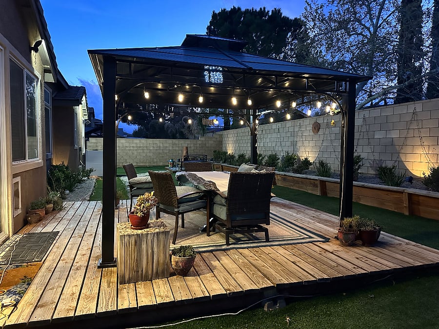 Enjoy the night time with my well lite yard and bbq a delicious dinner for yourself. 