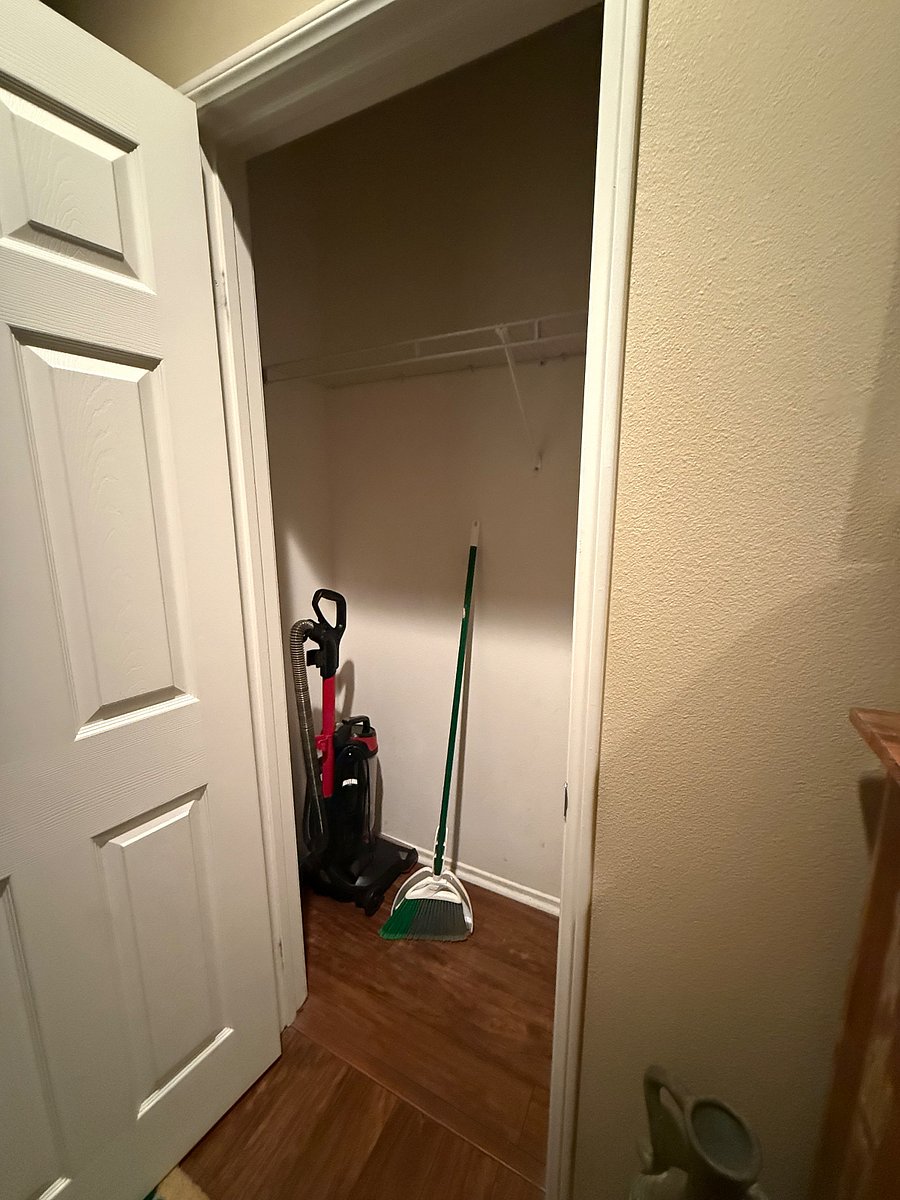 Extra closet for storage near the front door with your vacuum, broom and cleaning supplies. 