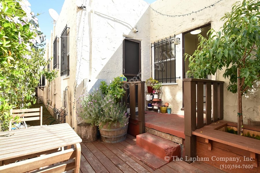 Shaded back patio space, I now have a little raised ground herb garden but no table