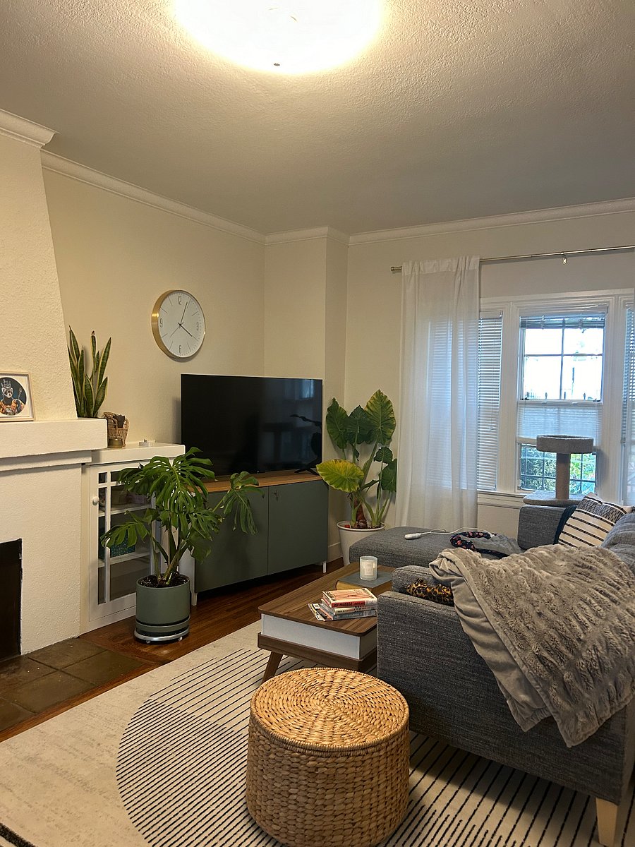 Living room with smart tv and L shaped couch