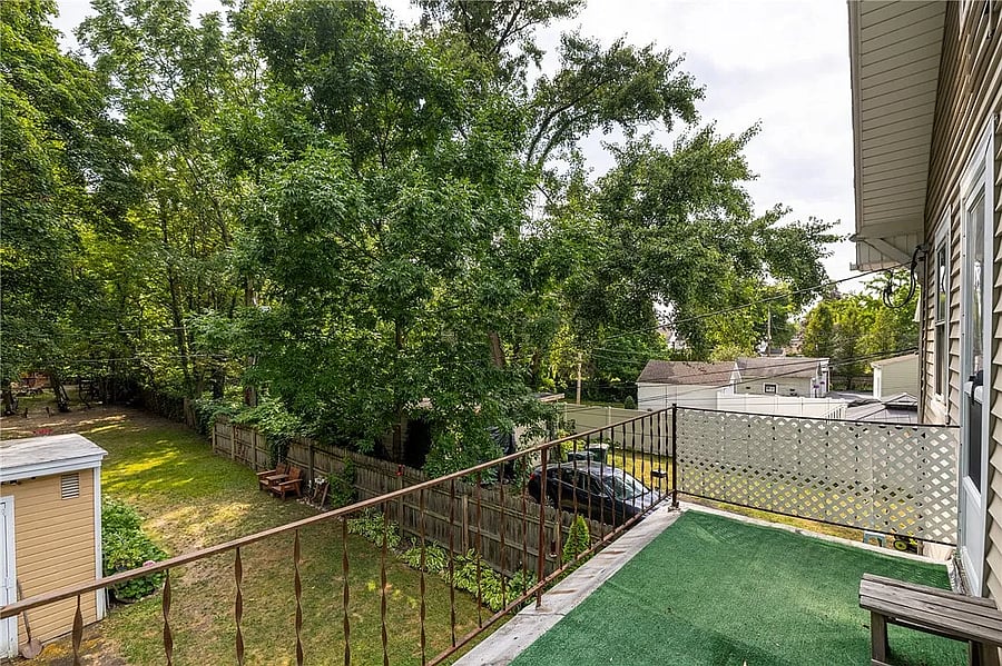 balcony overlooking backyard