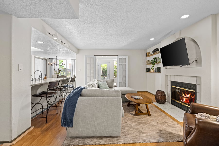 second living room with access to backyard and right off the kitchen- allowing everyone to be together