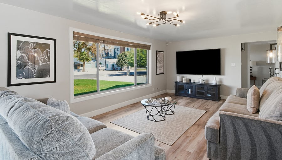 Large smart TV and decorative lighting.