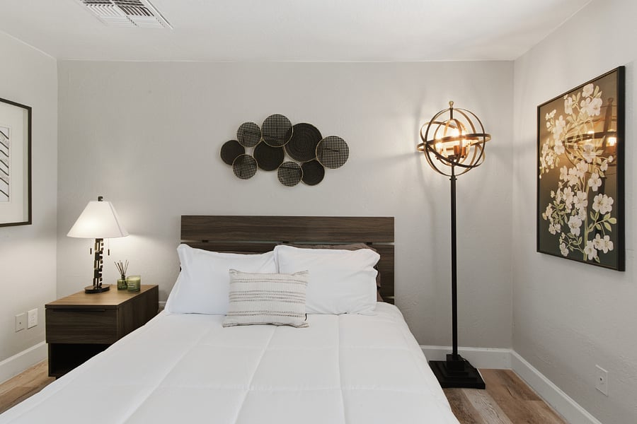 Bedroom #1 Queen size bed, fresh new linens and fun sculpture and lighting features.