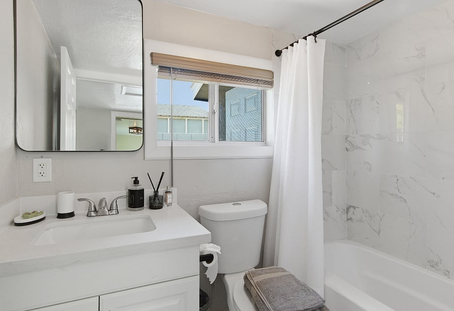 Bathroom #2 Full size shower and tub. Upgraded lights and mirrors.